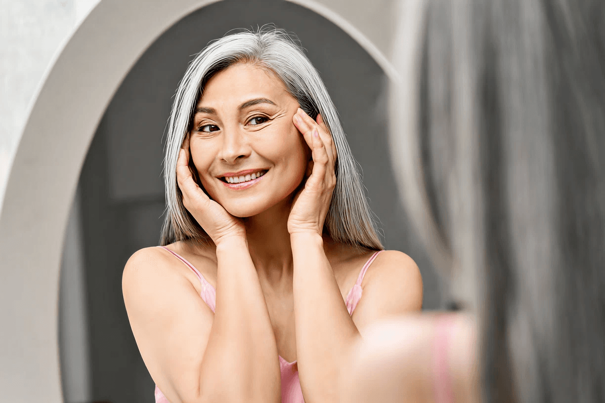 Smiling woman with grey hair