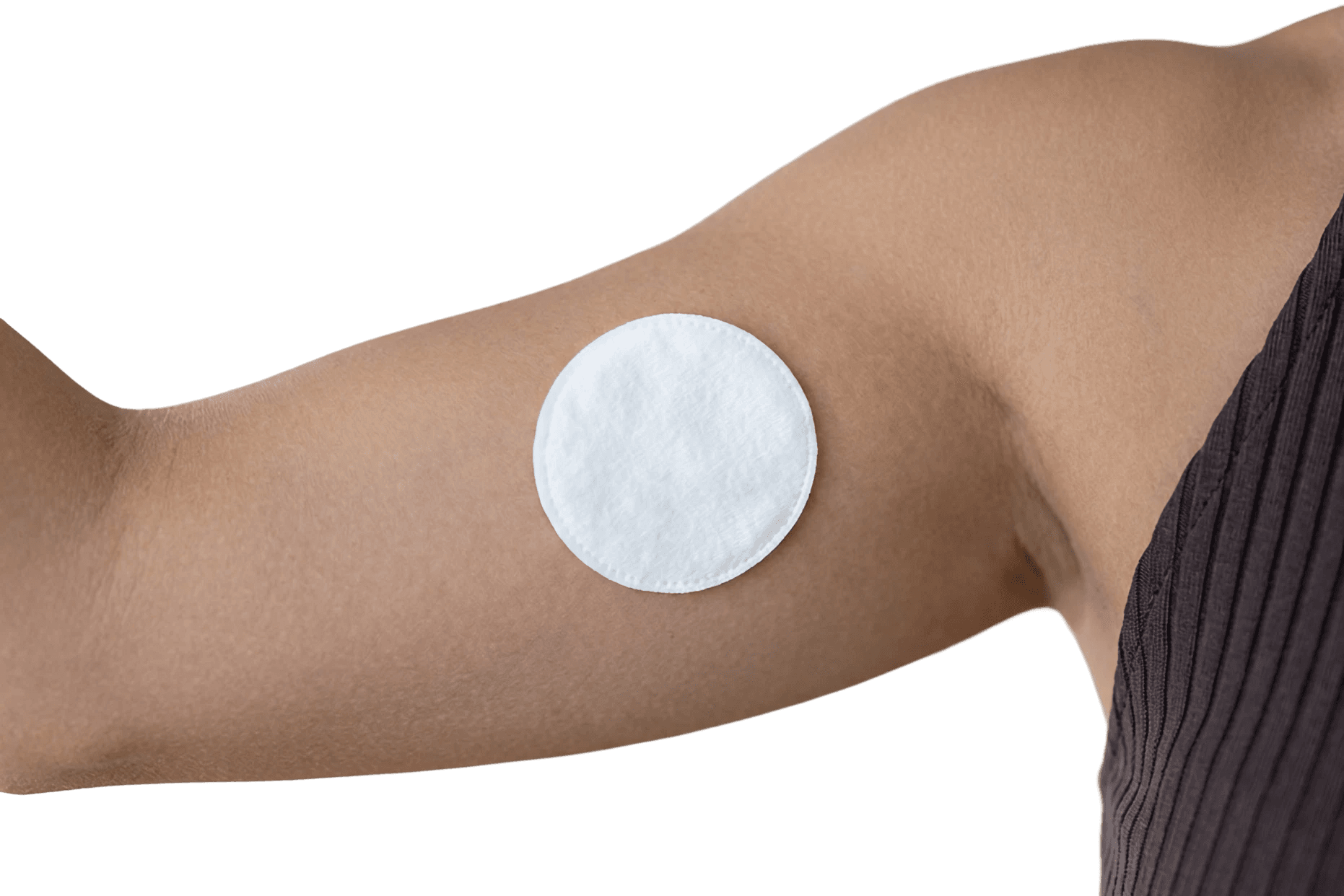 Arm with a cotton pad after an at-home blood draw